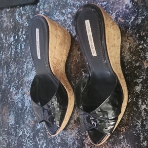 Woman's 👠  Via Spiga size 7.   Heel is 3 1/2 inches high color shiny black